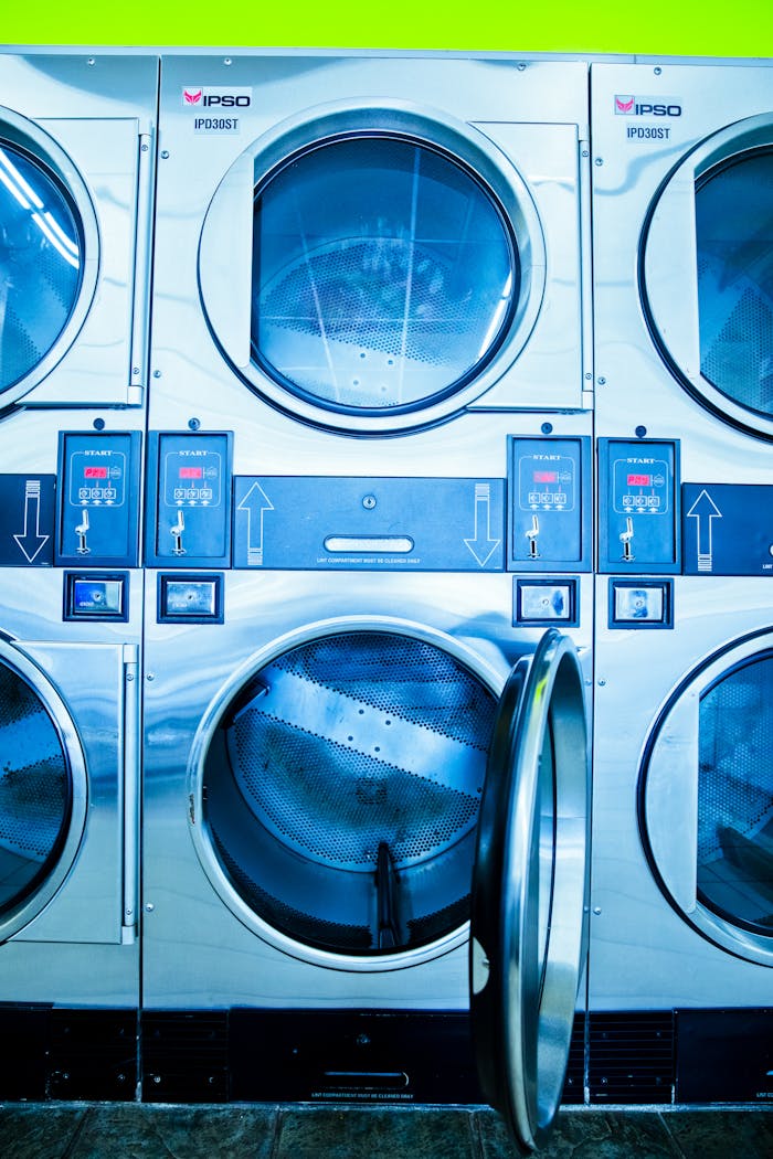services-02 High-tech washing machines in a Los Angeles laundromat. Bright, contemporary look.